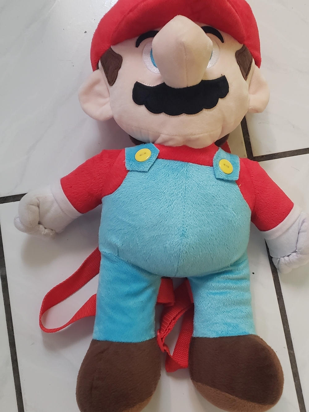 Like new " Super Mario" plush like backpack with opening for smalls, straps